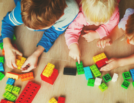 children playing with toy blocks